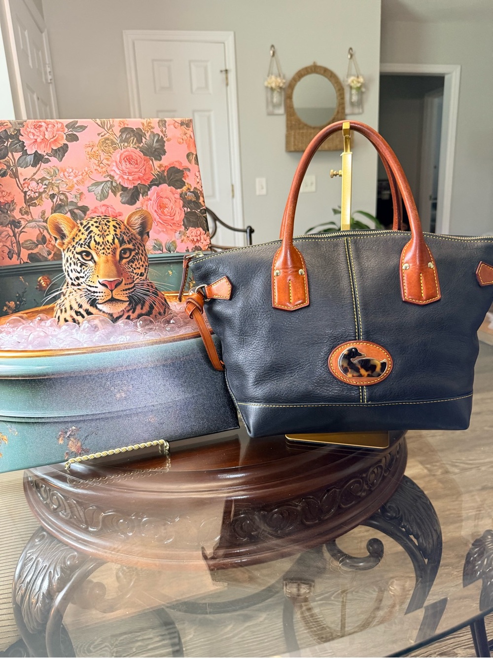 Dooney & Bourke Black Leather Tote with Brown Trim and tortoise shell duck